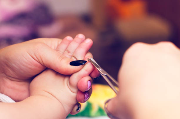 How can I cut my newborn's nails at home?