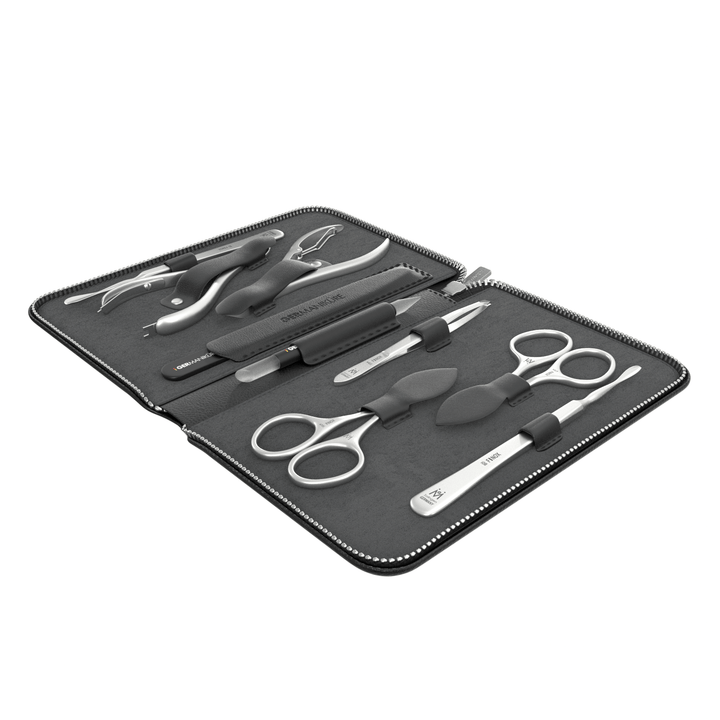 9 Piece Manicure Set in Zipper Case: 2 Scissor, 2 Nipper, Nail Cleaner, Cuticle Pusher, Glass File, Cuticle Stick, and Tweezer