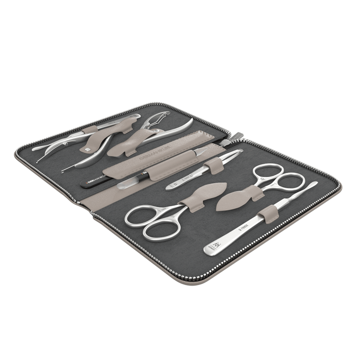 9 Piece Manicure Set in Zipper Case: 2 Scissor, 2 Nipper, Nail Cleaner, Cuticle Pusher, Glass File, Cuticle Stick, and Tweezer