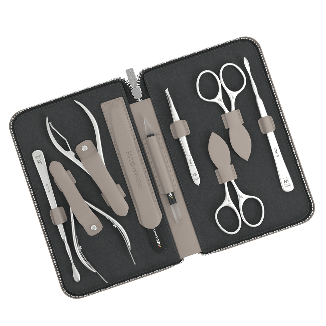 9 Piece Manicure Set in Zipper Case: 2 Scissor, 2 Nipper, Nail Cleaner, Cuticle Pusher, Glass File, Cuticle Stick, and Tweezer